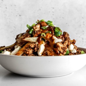 West Indian Curry Chicken Poutine is a Must-Try