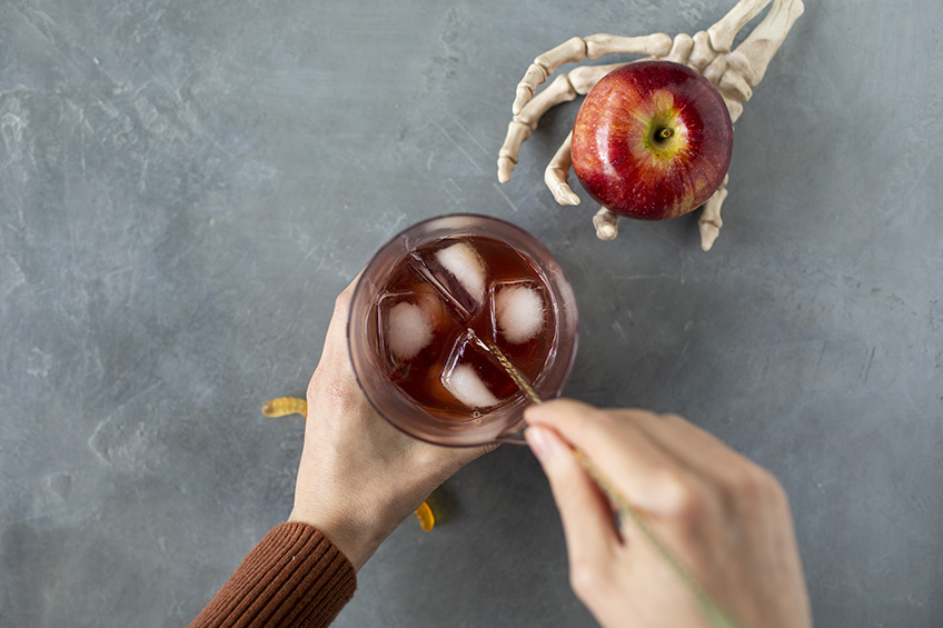 stirring Marcella DiLonardo's poison apple cocktail