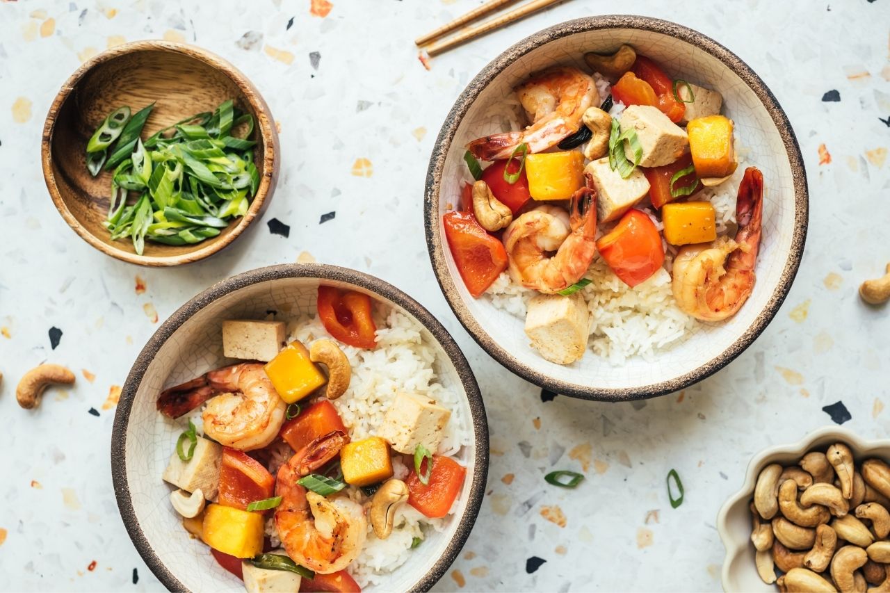 Sweet and sour shrimp and tofu in two bowls