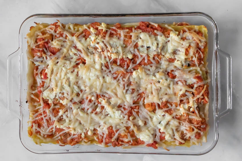 The perfect vegan lasagna topped with melty vegan mozzarella.