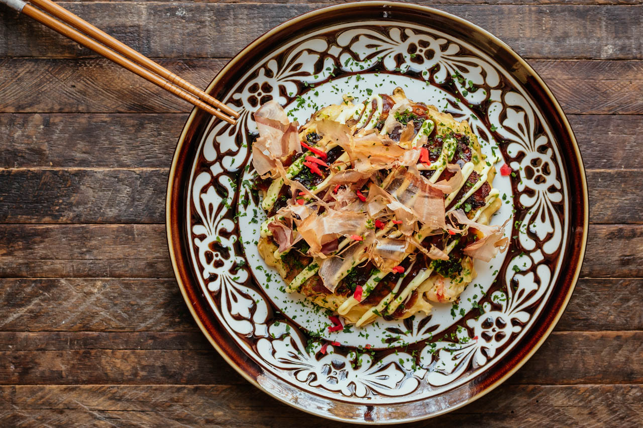 Okonomiyaki on a patterned plate