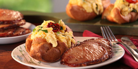 Black Pepper Popovers filled with Vermont Cheddar and Herb Scrambled Eggs and Maple-Mustard Glazed Canadian Bacon