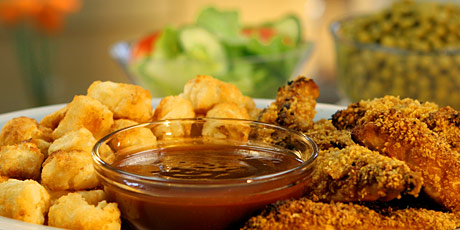 Crunchy Chicken with Potato Puffs, Peas and Salad