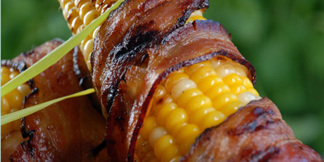 Grilled Corn On The Cob Wrapped In Bacon