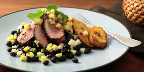 Jerk Pork Tenderloin with Chayote Black Beans, Pineapple Salsa and Fried Plantains