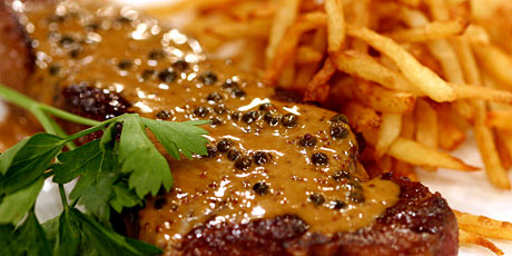 New York Strip with Green Peppercorn Sauce and Shoestring Frites