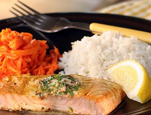 Poached Orange Salmon with Cilantro Butter, Rice and Carrot Slaw