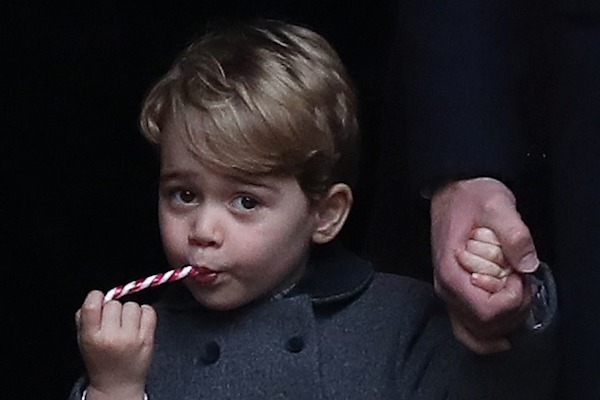 Prince George of Cambridge eating a candy cane