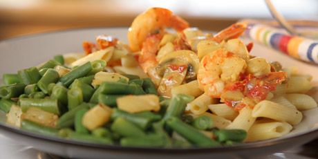 Seafood Curry with Sundried Tomatoes and Warm Pineapple on Pasta with Green Beans