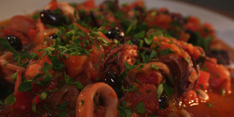 Squid Stewed with Tomatoes, White Wine and Black Olives