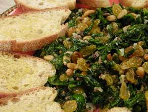 Wilted Greens with Raisins, Pine Nuts and Garlic Croutes