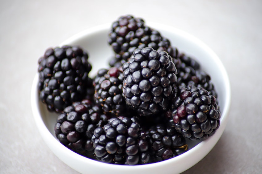 white bowl filled with Blackberries