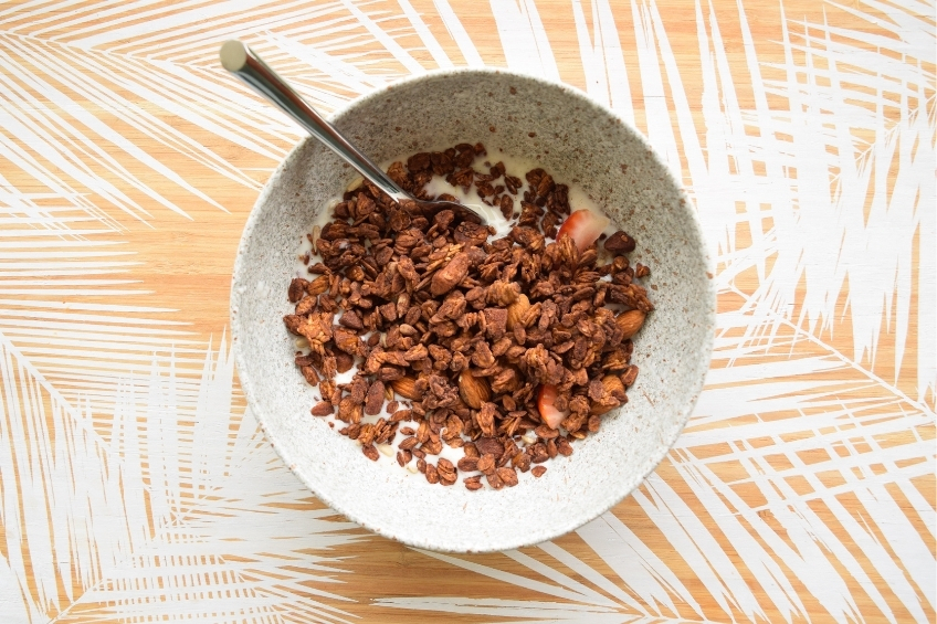 Cocoa cereal in a bowl with milk