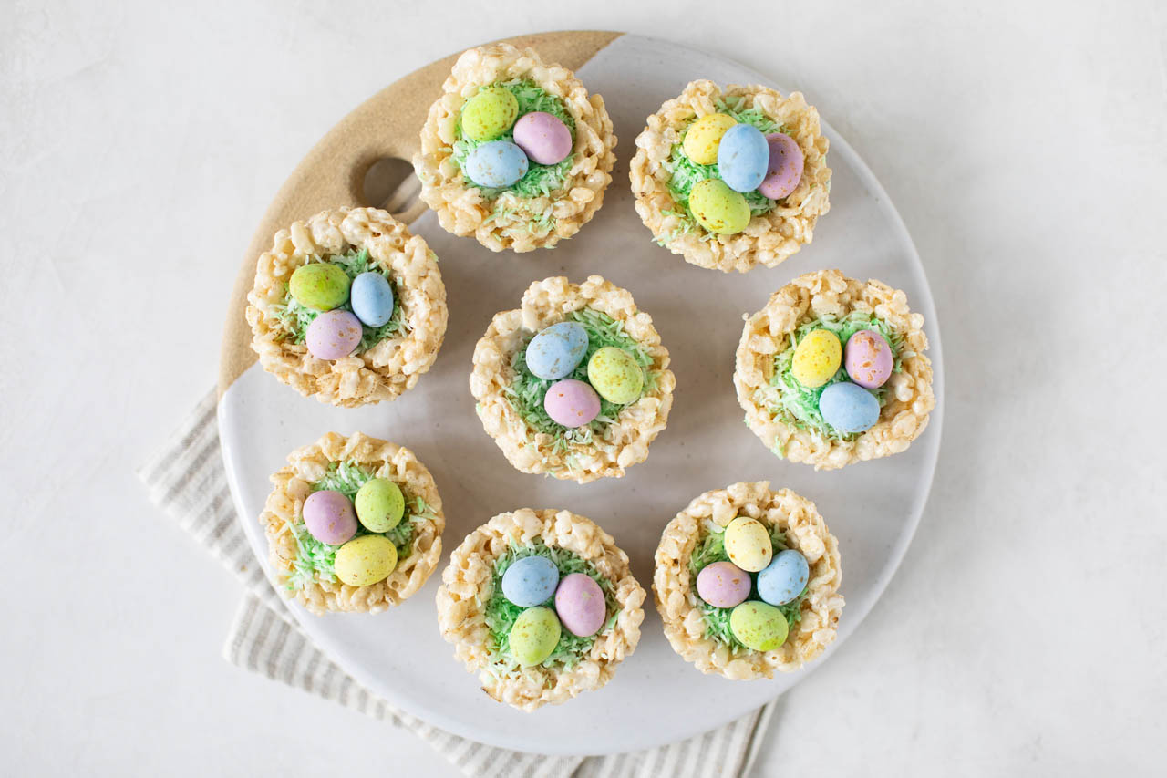 Rice Krispie Easter nests on a serving board