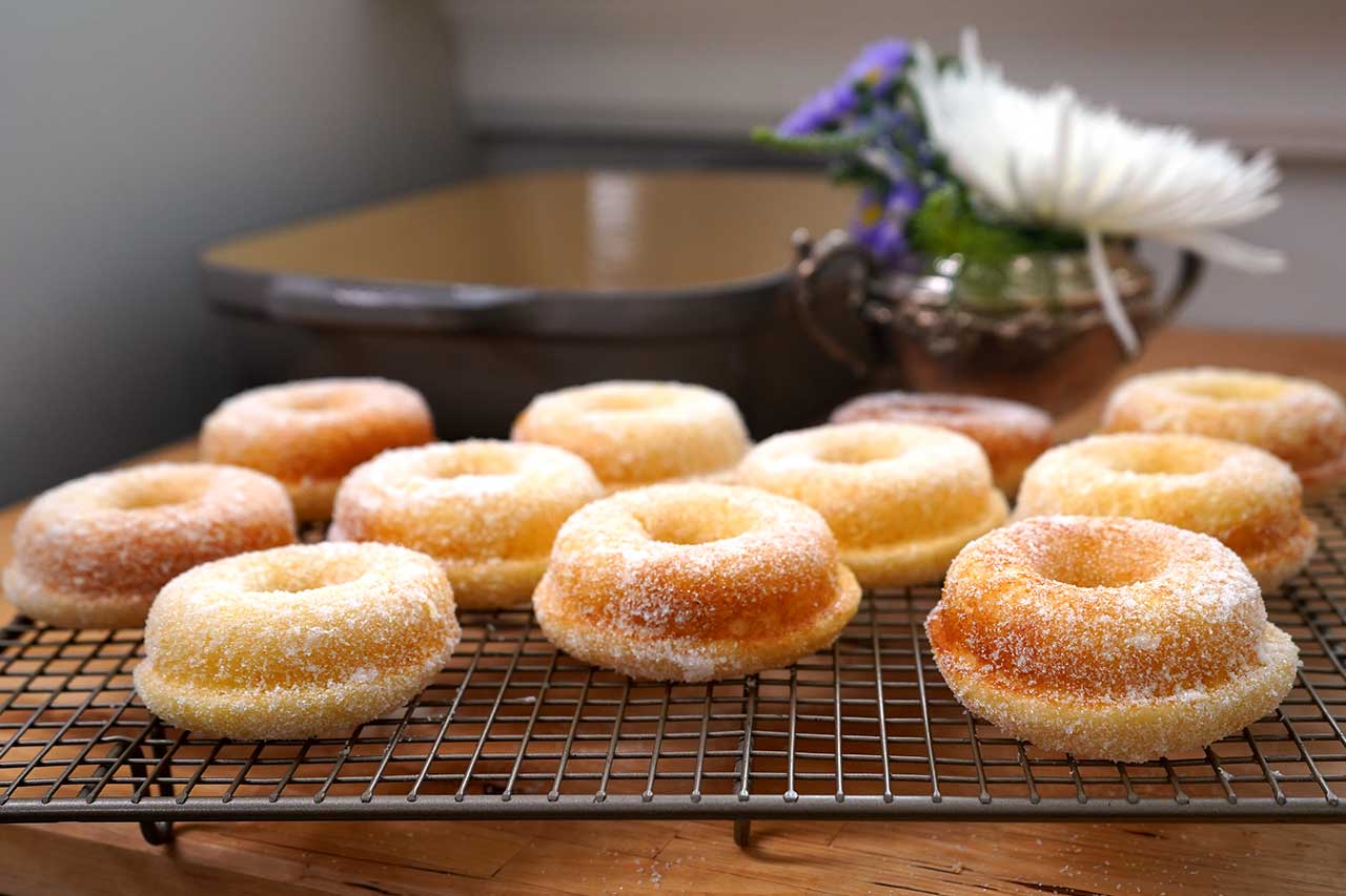 lemon doughnuts on a baking rack