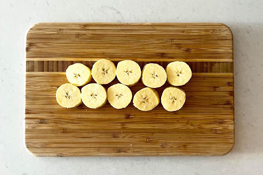 Plantain pieces on a cutting board