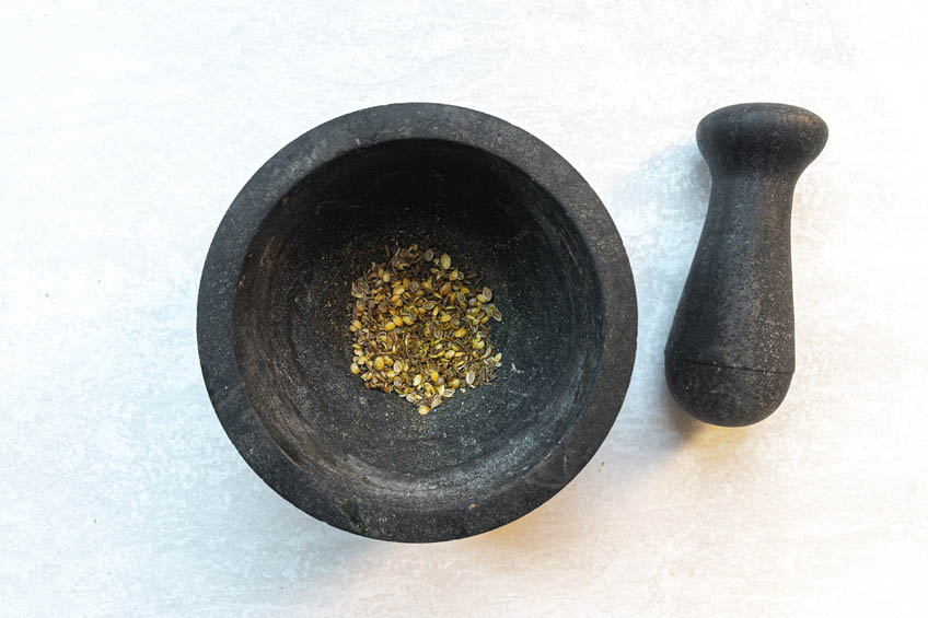 Ground spices in a mortar and pestle