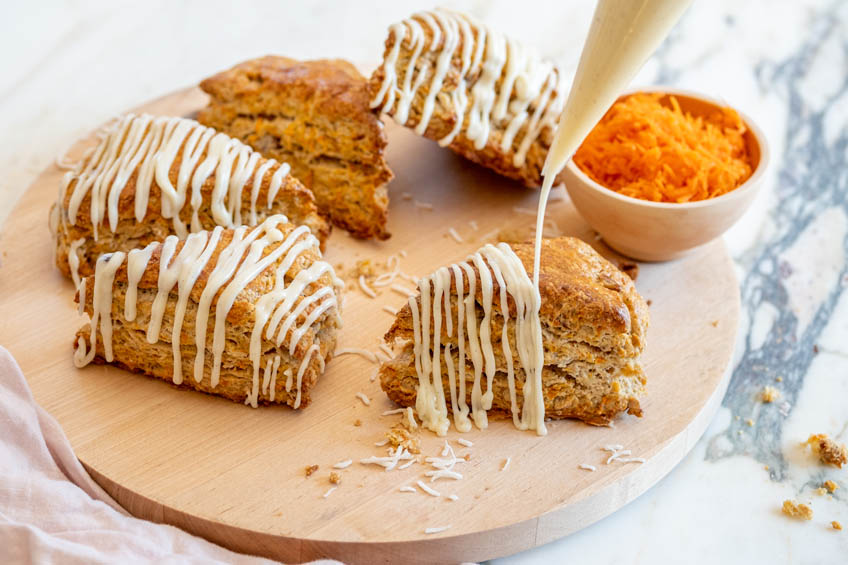 Carrot cake scones drizzled with cream cheese glaze