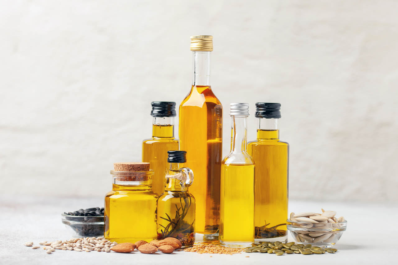 A variety of cooking oils in glass bottles