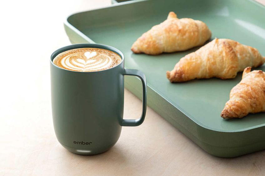 Ember mug with a latte and three croissants beside it on a tray