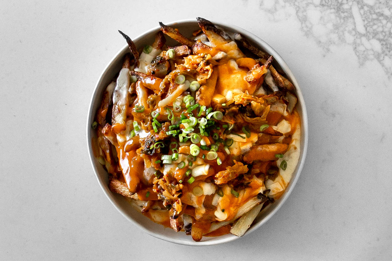 Kimchi poutine in a bowl