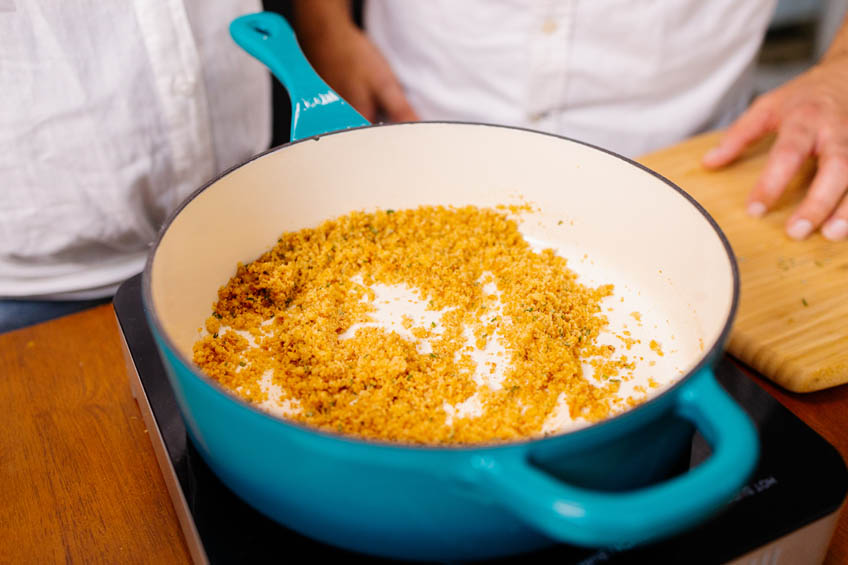 Bread crumbs toasting in a dutch oven
