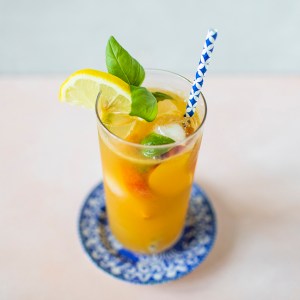 This Delicious Non-Alcoholic Peach, Basil and Ginger Kombucha Punch is a BBQ Season Crowd-Pleaser