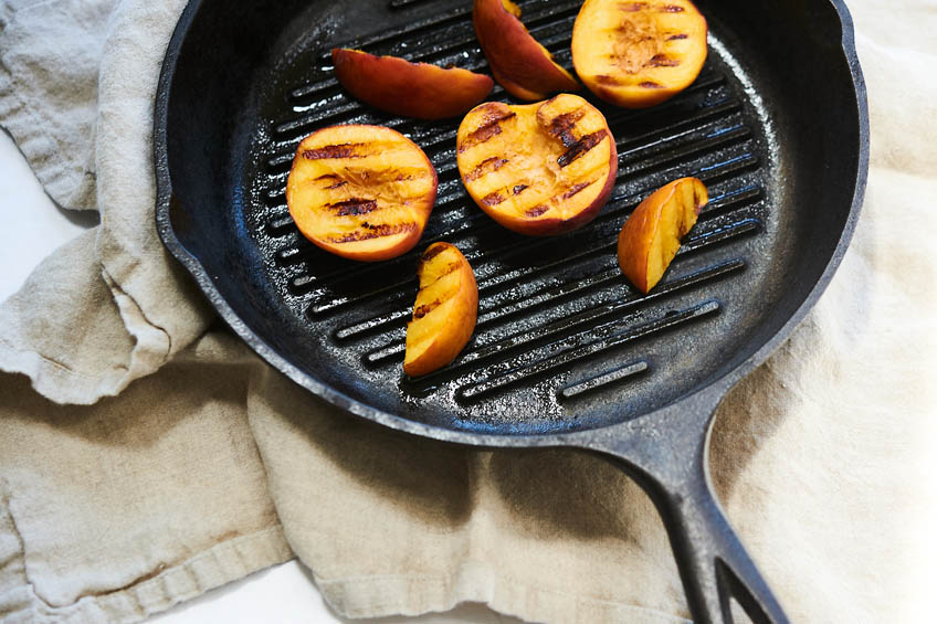 Grilled peaches on a grill pan