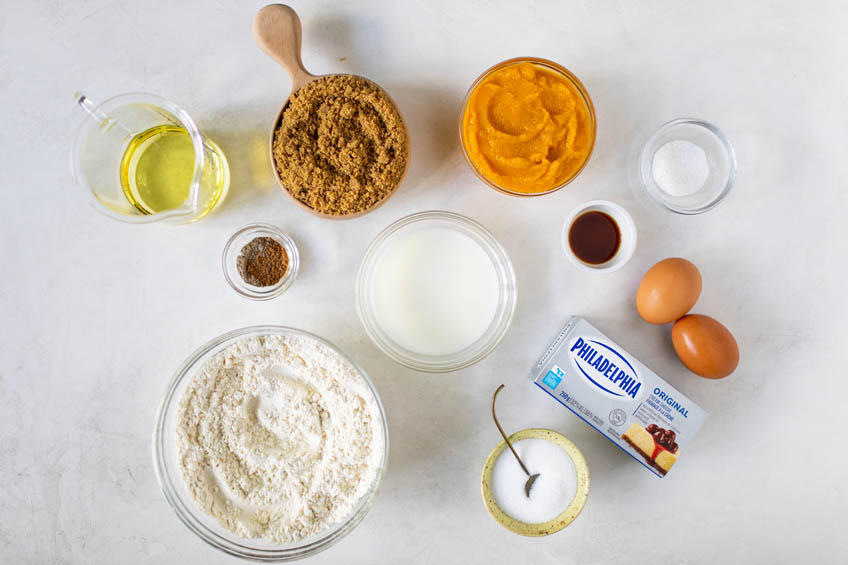Ingredients for pumpkin cardamom cream cheese muffins