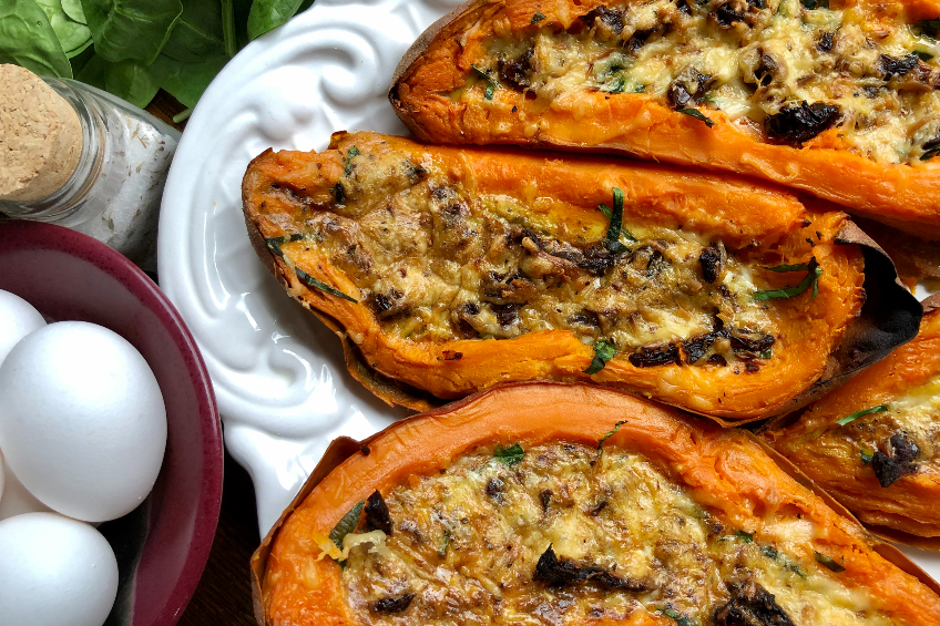 Sweet potato boats stuffed with an egg and cheese mixture