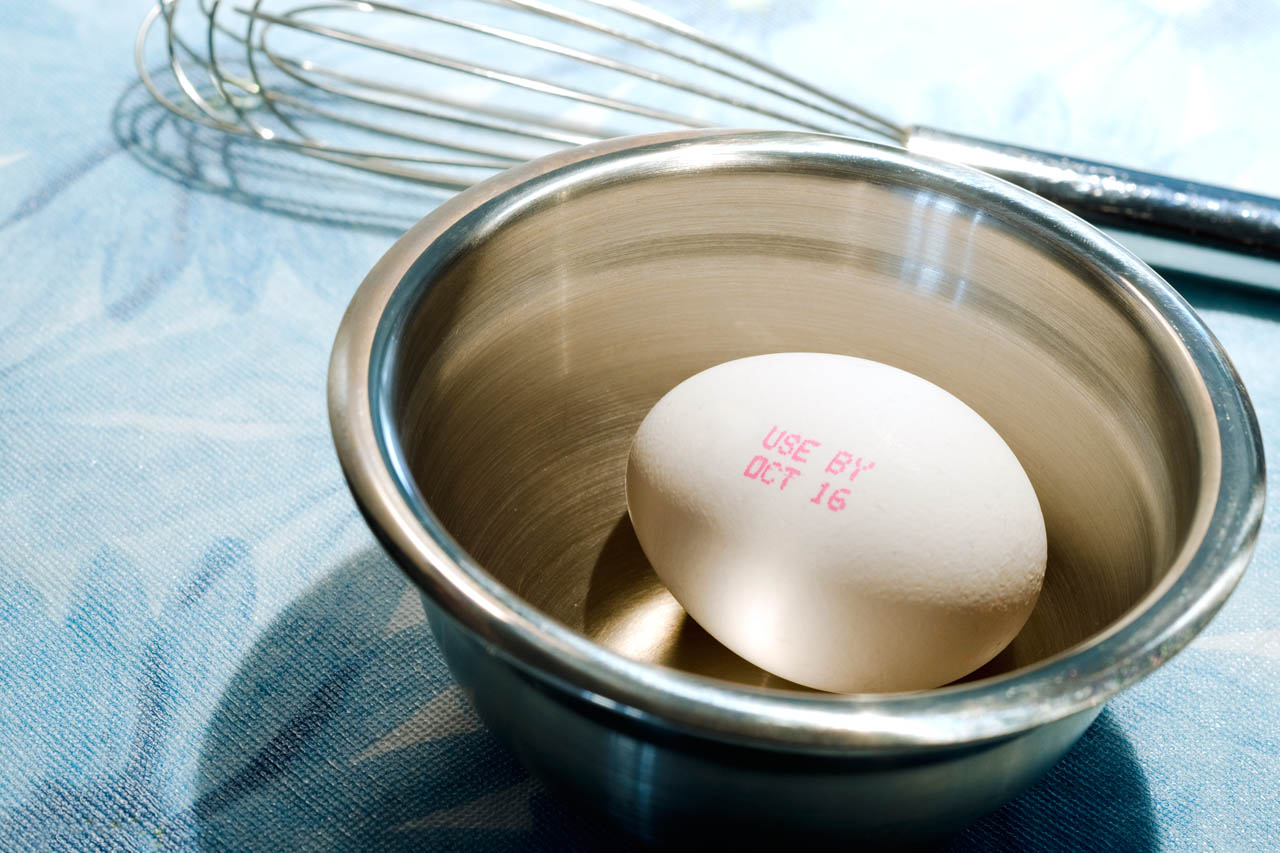 An egg in a steel bowl