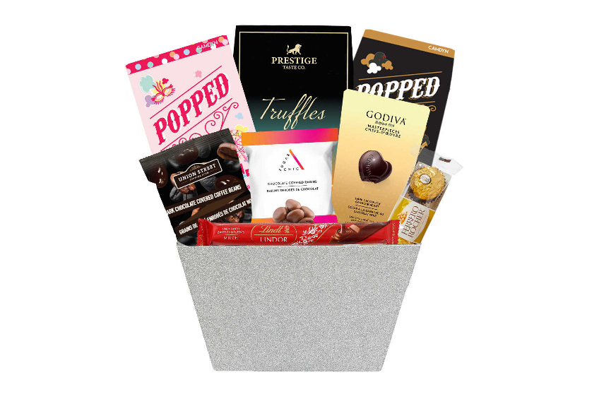 A gift set featuring various chocolates and popcorn