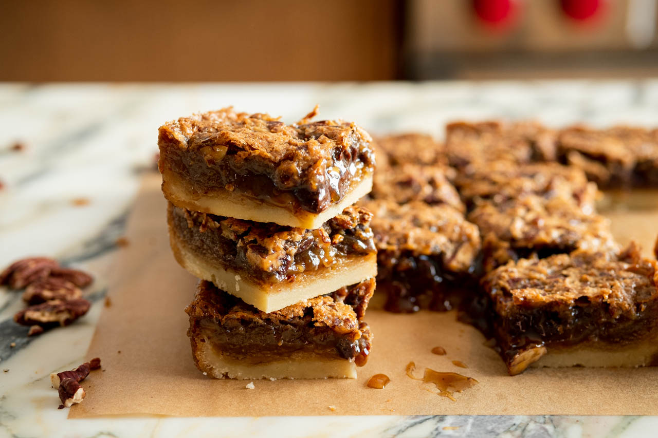 A stack of brown butter maple pecan squares