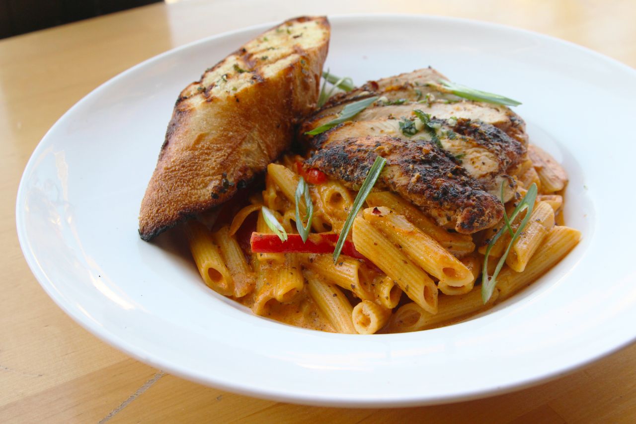 grilled chicken with pasta and toasted bread