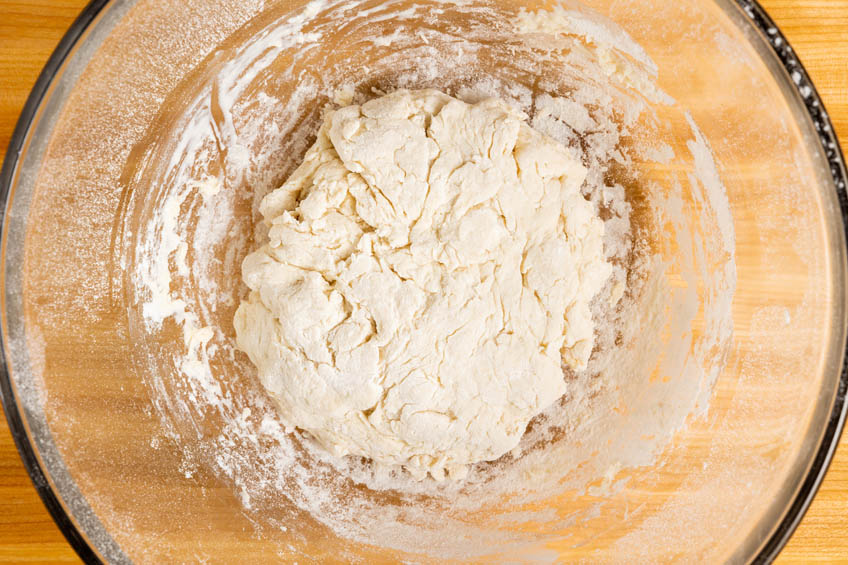 Dough mixture in a bowl for Acadian chicken fricot