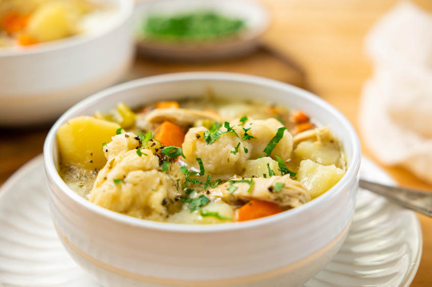 A closeup of Acadian chicken fricot in a bowl