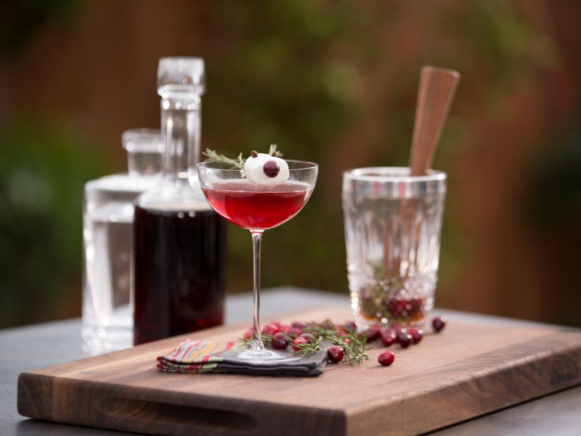 Cranberry cocktail with a rosemary cranberry ice cube