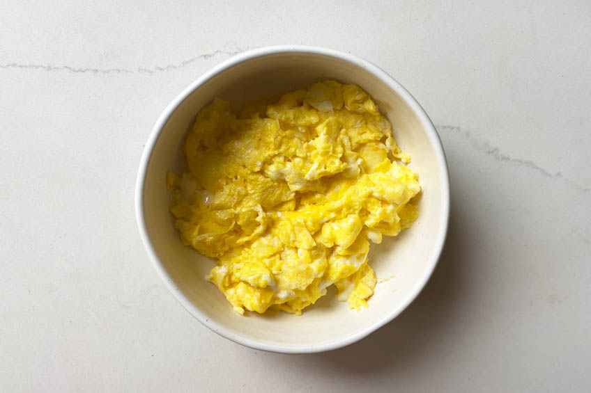 A bowl of scrambled eggs