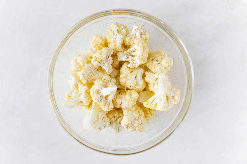 Cauliflower in a glass mixing bowl