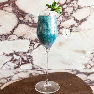 This Glittery Blue Lagoon Cocktail Will Make Your Evening Sparkle