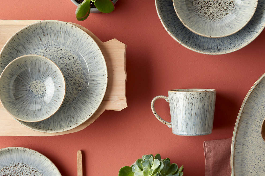 A product shot of the Denby speckled stoneware dinner set