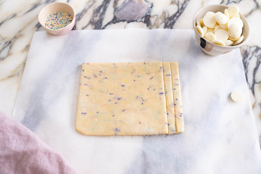 Birthday cake cookie dough shaped into a rectangle