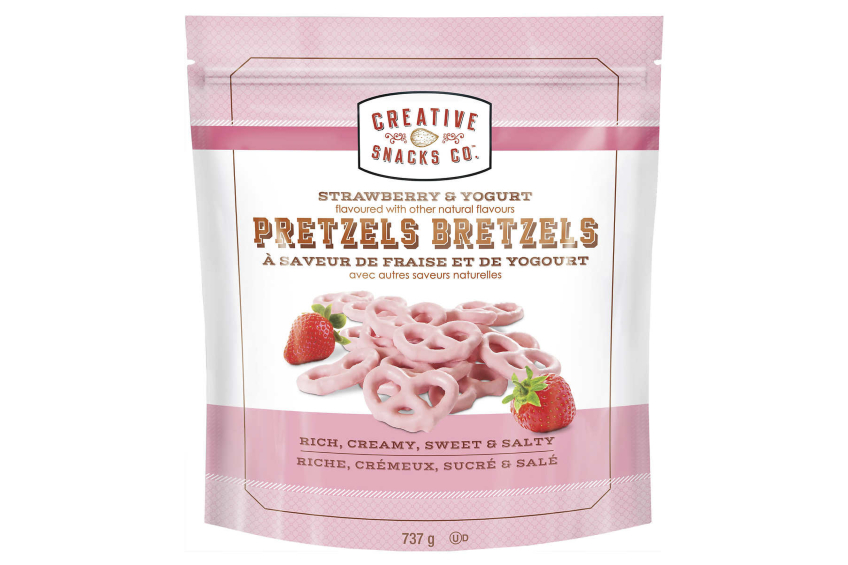 The product shot of the pink packaging of the Creative Snacks Co. strawberry yogurt-flavoured pretzels