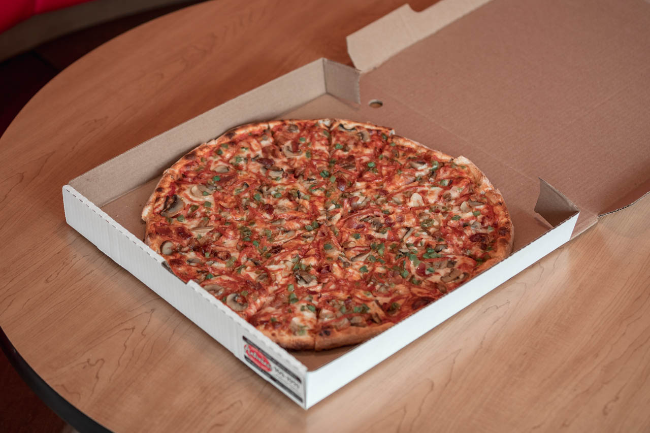 Antonino's Windsor-style pizza in a pizza box