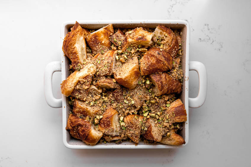 Unbaked baklava French toast in a baking dish