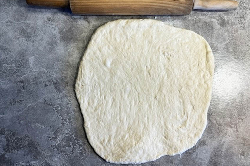 Rolled bannock dough on a countertop