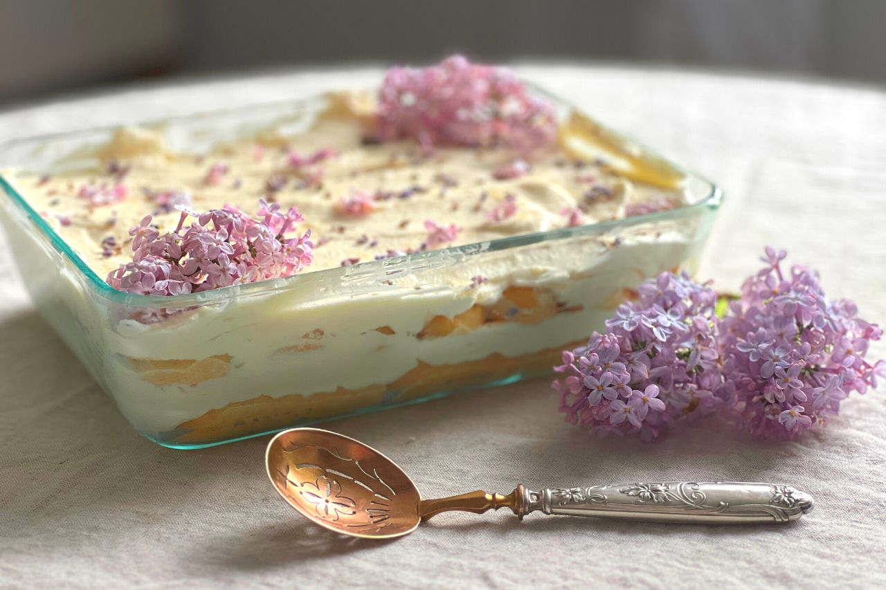 lilac and lavender cream tiramisu with vintage spoon and lilac flowers