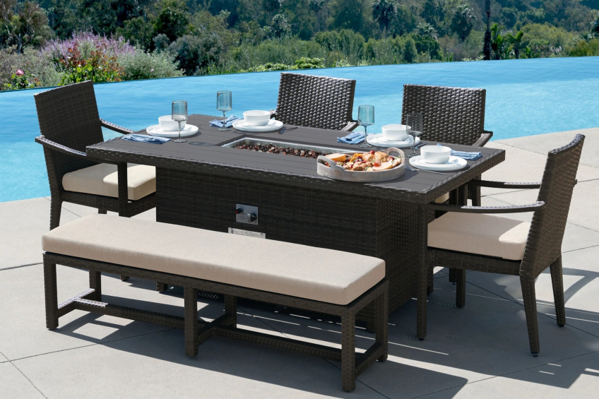 A 6-piece patio furniture set with fire table, four dining chairs and a long bench