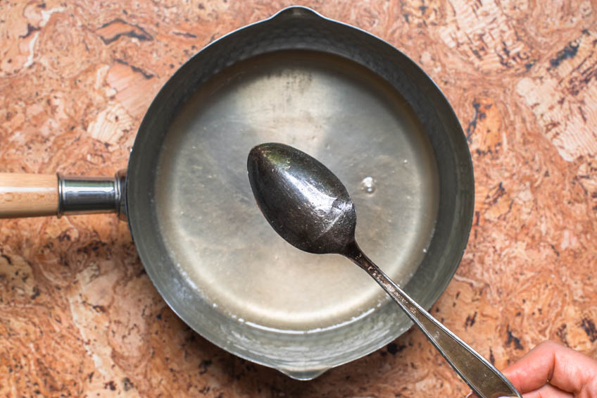 Water, sugar and agar agar in a pot