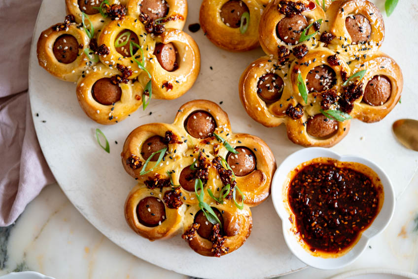 Chinese hotdog flower buns topped with chili crisp